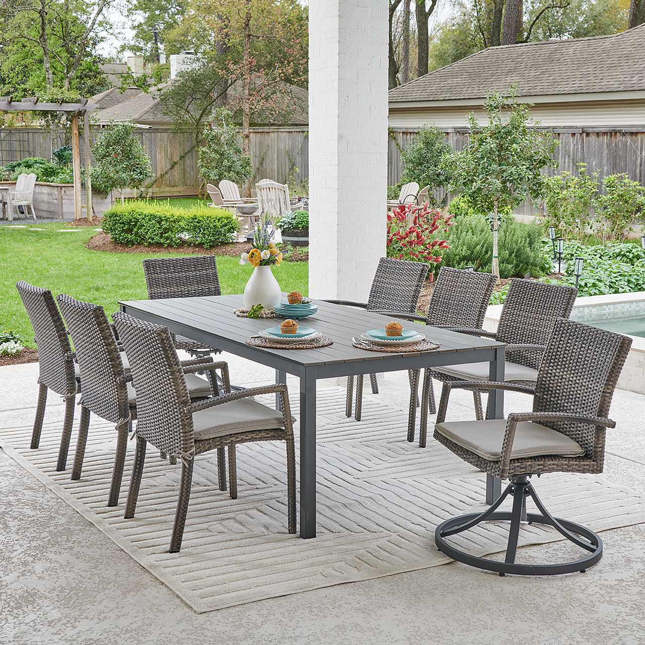 Contempo Husk Outdoor Wicker with Cushions 9 Piece Swivel Combo Dining Set + 83 x 41 in. Table