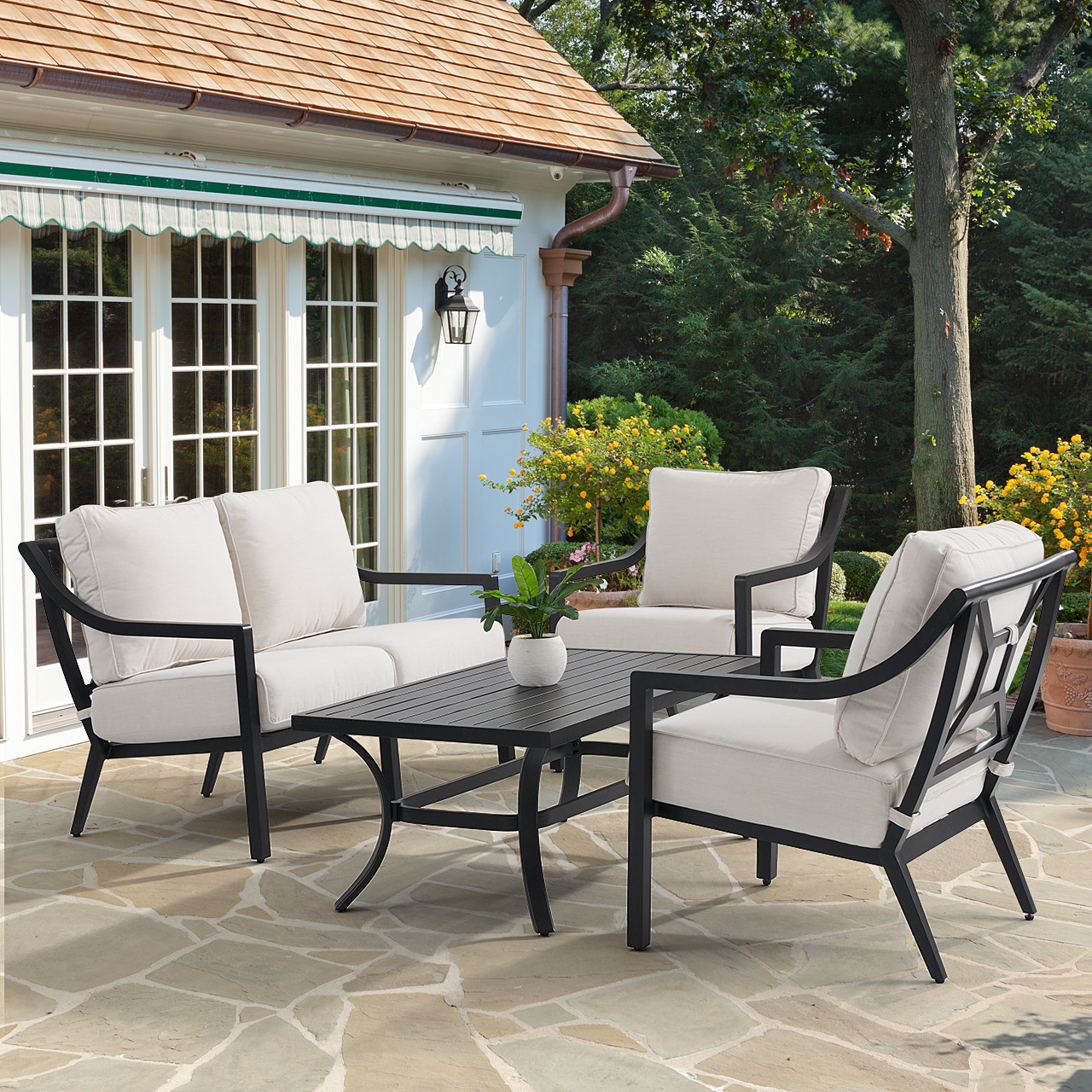 Hill Country Aged Bronze Aluminum and Cushion 4 Piece Loveseat Group + 48 x 28 in. Coffee Table