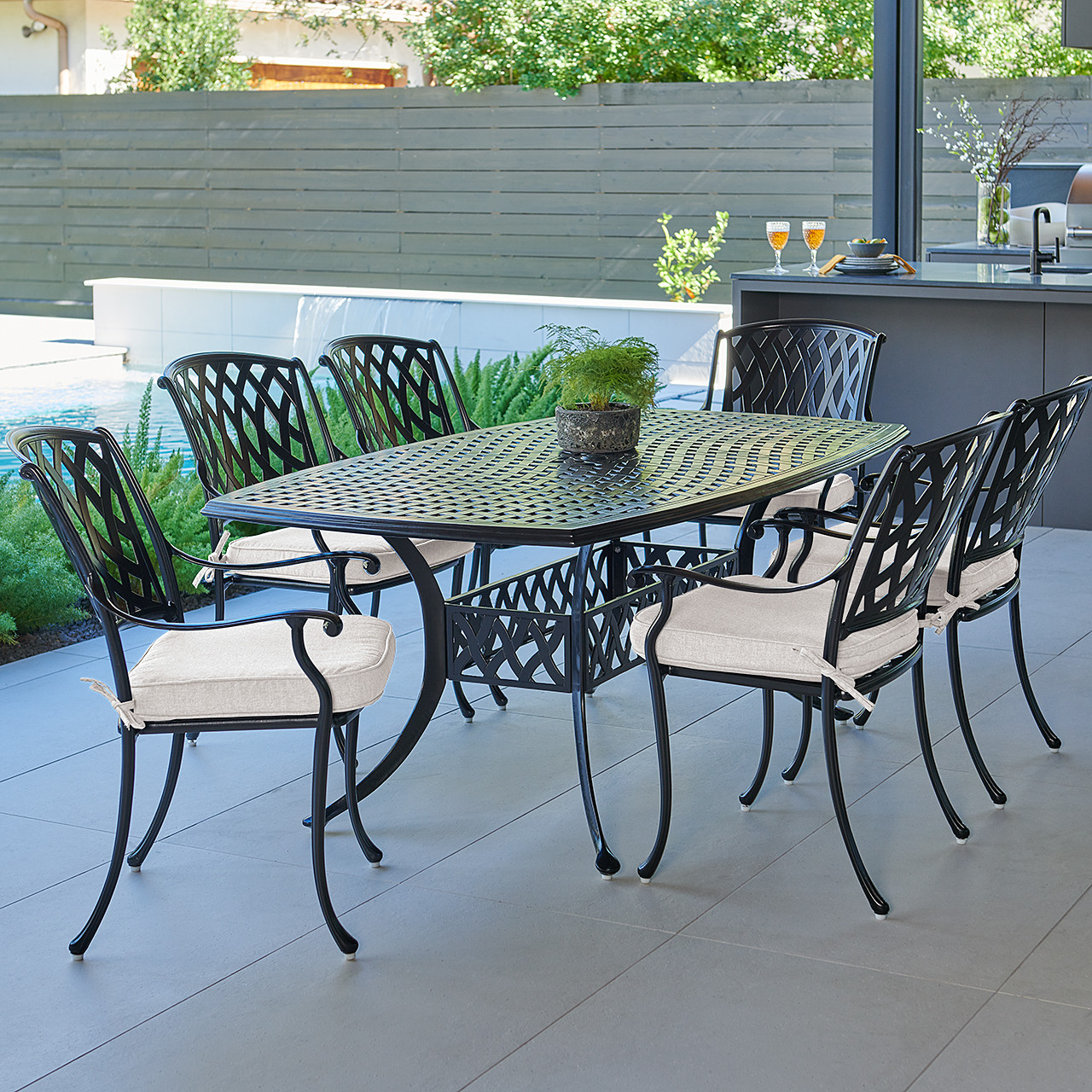 Tivoli Matte Black Cast Aluminum with Cushions 7 Piece Dining Set + 72 x 42 in. Table Tivoli Matte Black Cast Aluminum with Cushions 7 Piece Dining Set + 72 x 42 in. Table