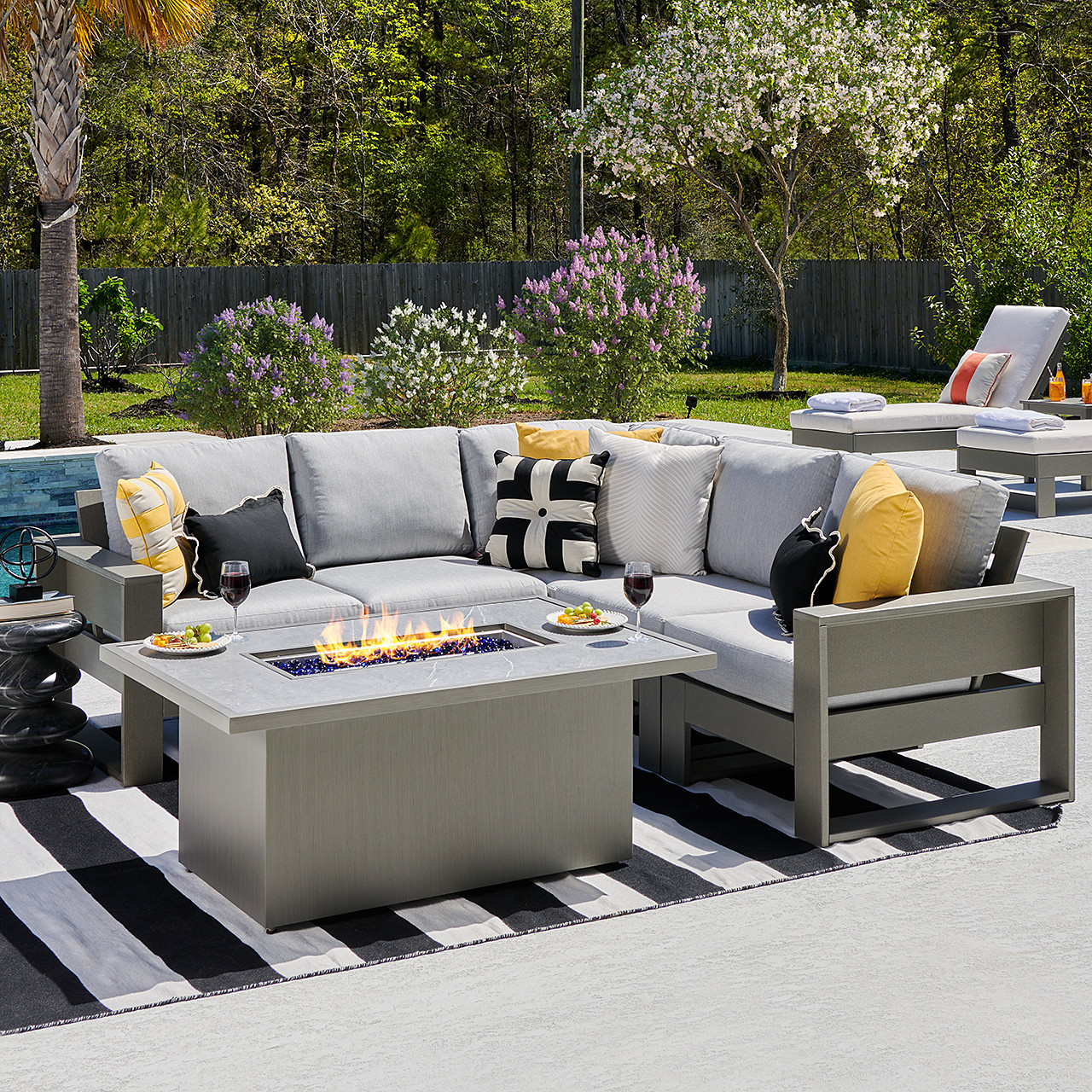 Montauk Slate Grey Polymer with Cushions 6 Piece Modular Sectional + 52 x 32 in. Fire Pit Table
