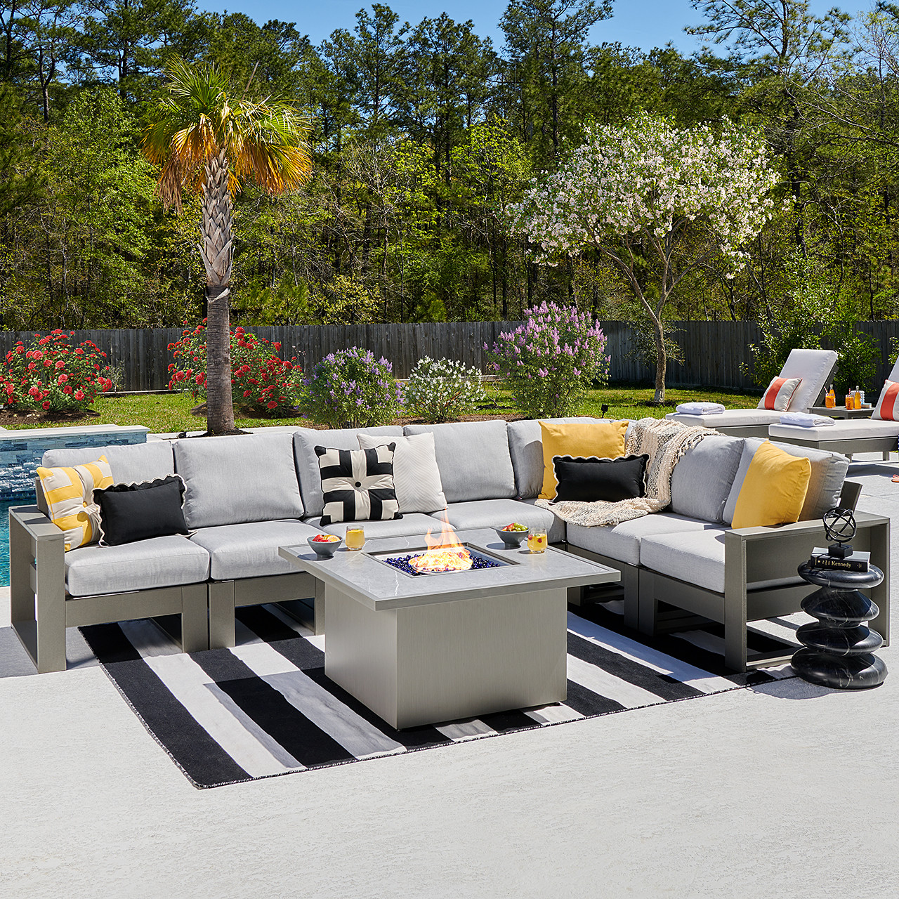 Montauk Slate Grey Polymer with Cushions 8 Piece Modular Sectional + 42 in. Sq. Sintered Fire Pit Table