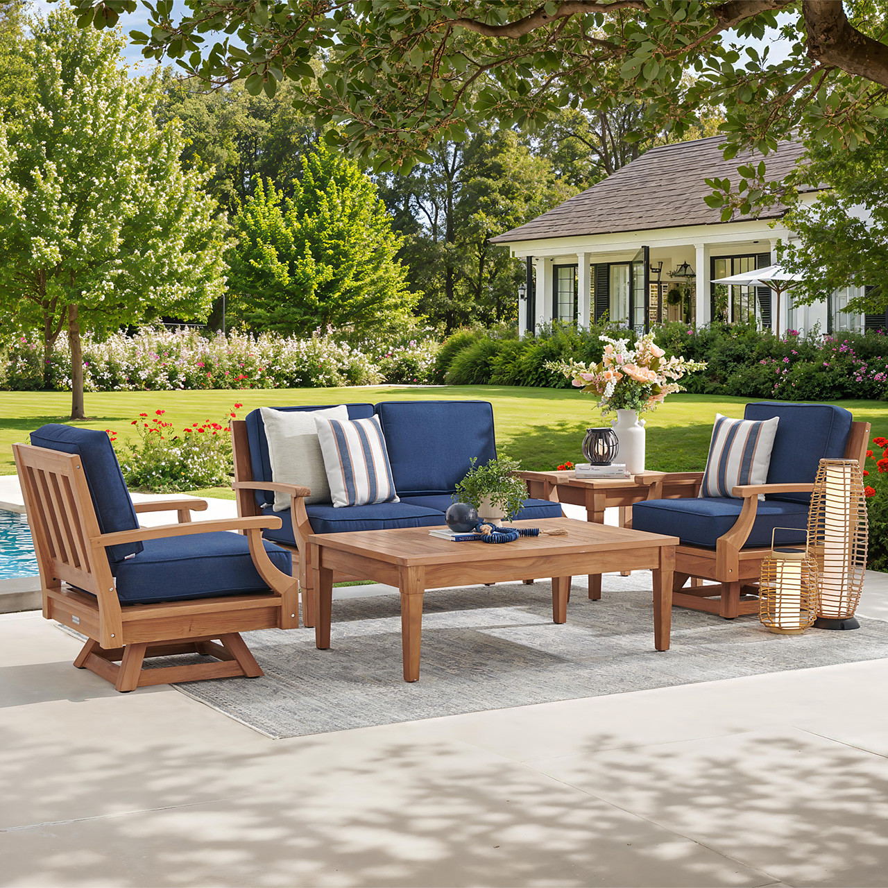 Grand Banks Teak with Cushions 4 Piece Swivel Loveseat Group + 47 x 31 in. Coffee Table