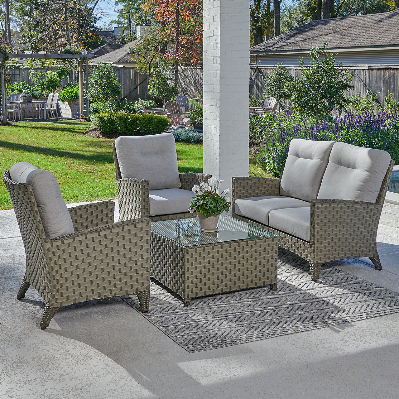 Gramercy Sea Grey Outdoor Wicker with Cast Silver Cushions 4 Piece Loveseat Set + 32 in. Sq