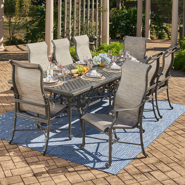 Florence Midnight Gold Cast Aluminum and Castelle Dune Sling 9 Piece Dining Set with 74-114 x 44 in. Double Extension Table Florence Midnight Gold Cast Aluminum and Castelle Dune Sling 9 Piece Dining Set with 74-114 x 44 in. Double Extension Table