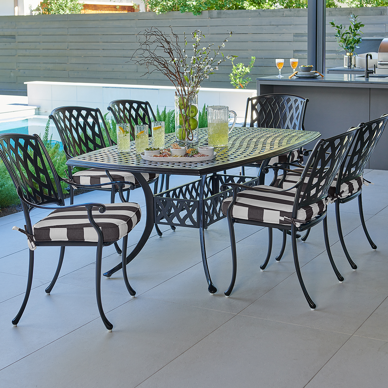 Tivoli Matte Black Cast Aluminum with Cushions 7 Piece Dining Set + 72 x 42 in. Table (Cabana Classic)