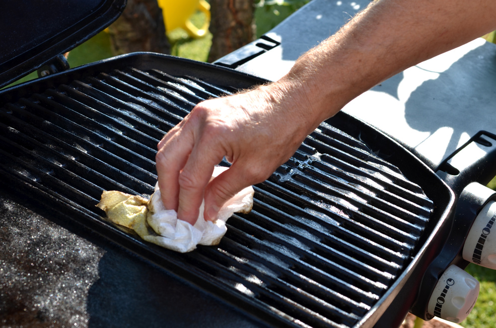 cleaning inside BBQ grill