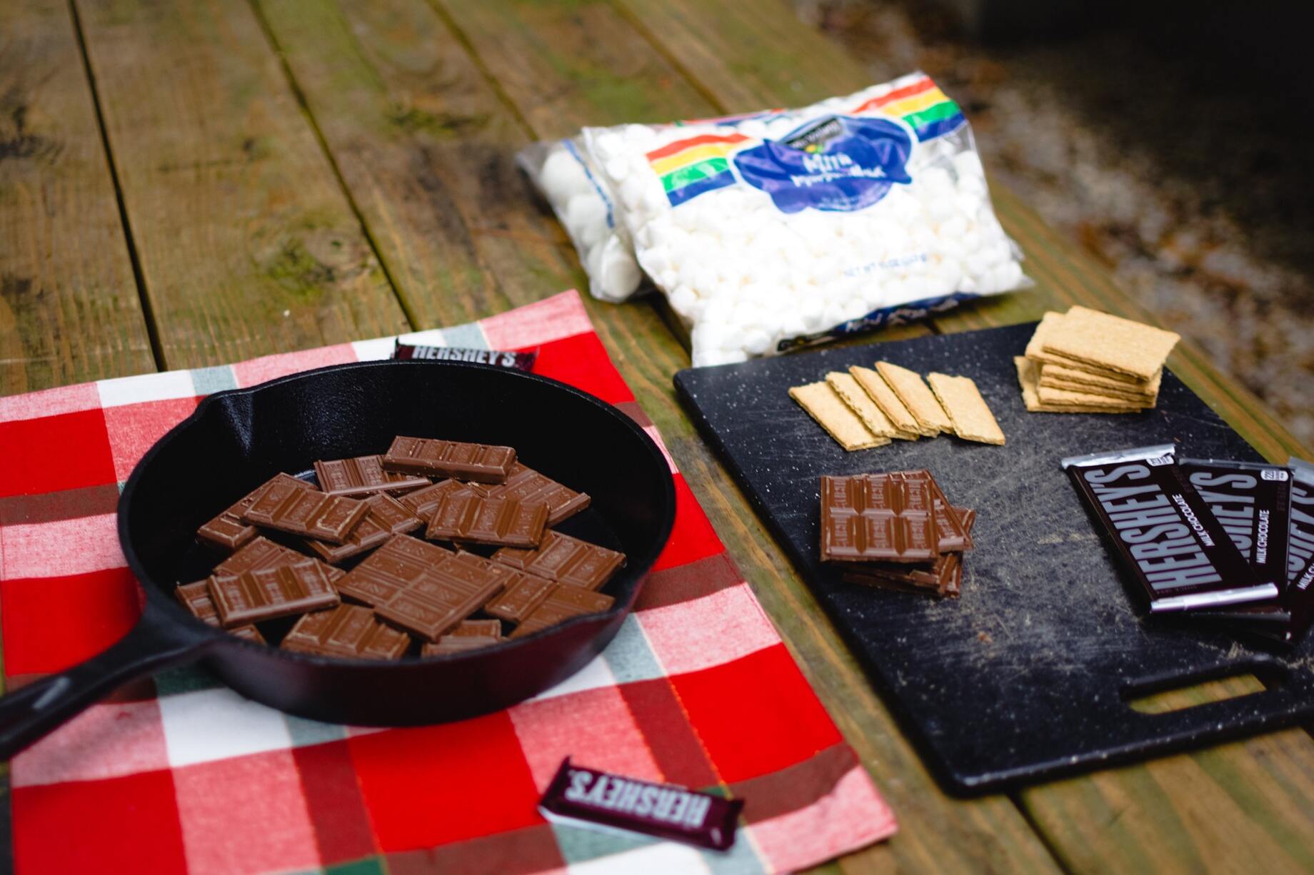 S’more ingredients on a picnic table