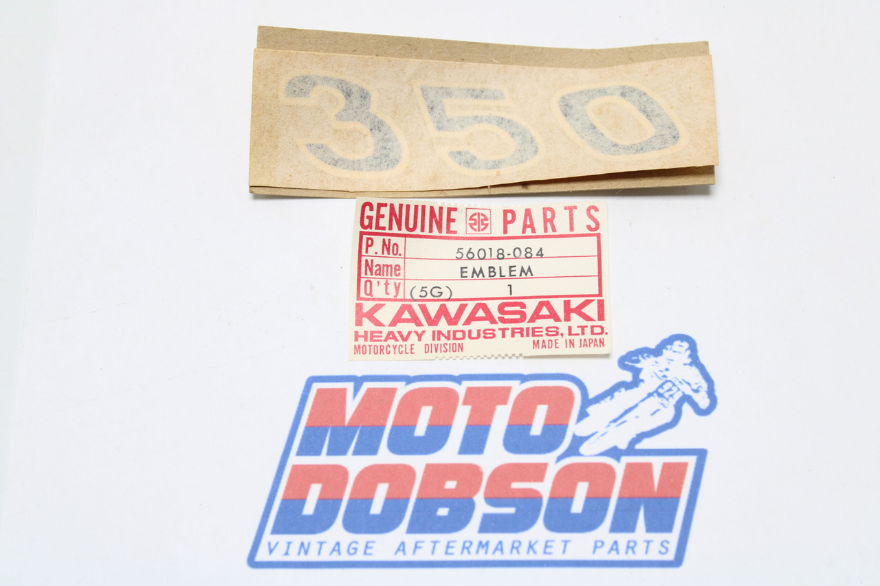 Kawasaki Mach II 1973-1972 56018-084 EMBLEM-L.H SIDE COVER