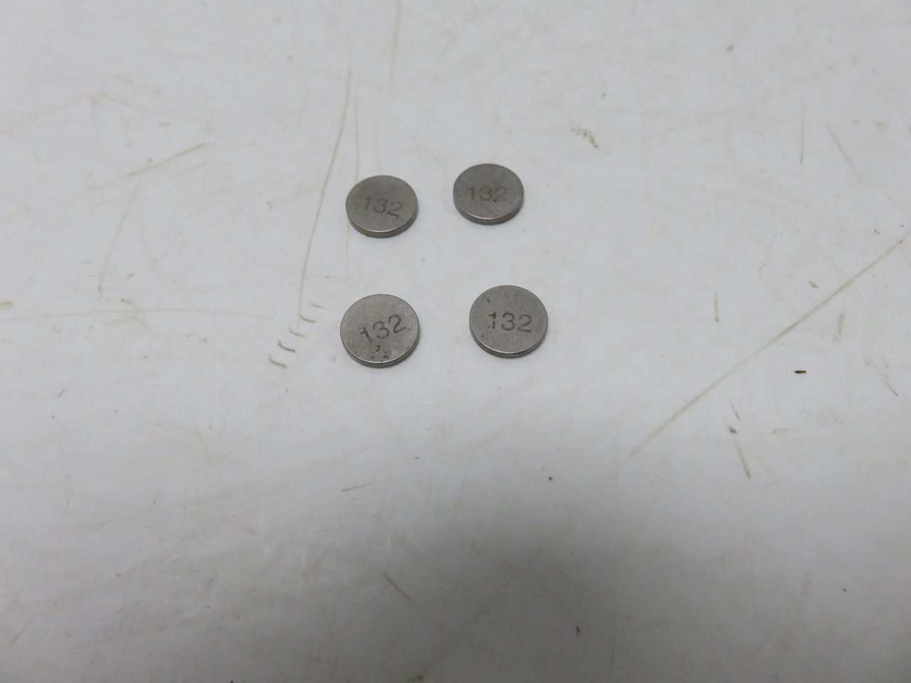 Honda 14906-MBB-000 SHIM, TAPPET (1.325) Genuine OEM Honda 14906-MBB-000 SHIM, TAPPET (1.325) Genuine OEM