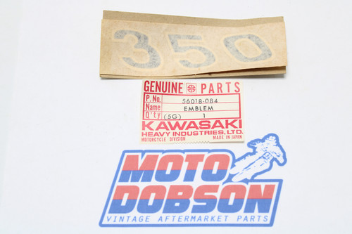 Kawasaki Mach II 1973-1972 56018-084 EMBLEM-L.H SIDE COVER