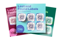 Three stacked sheets of Tile’s Lost and Found Labels