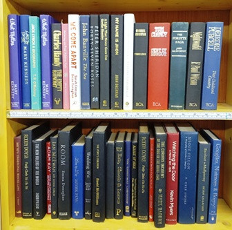 Meters of Varying Sized, Plain Covered, Hardback Books