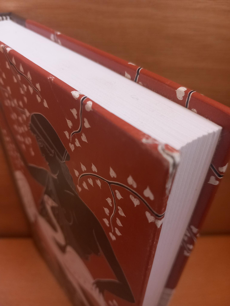 Corner bump to upper corner of the binding.