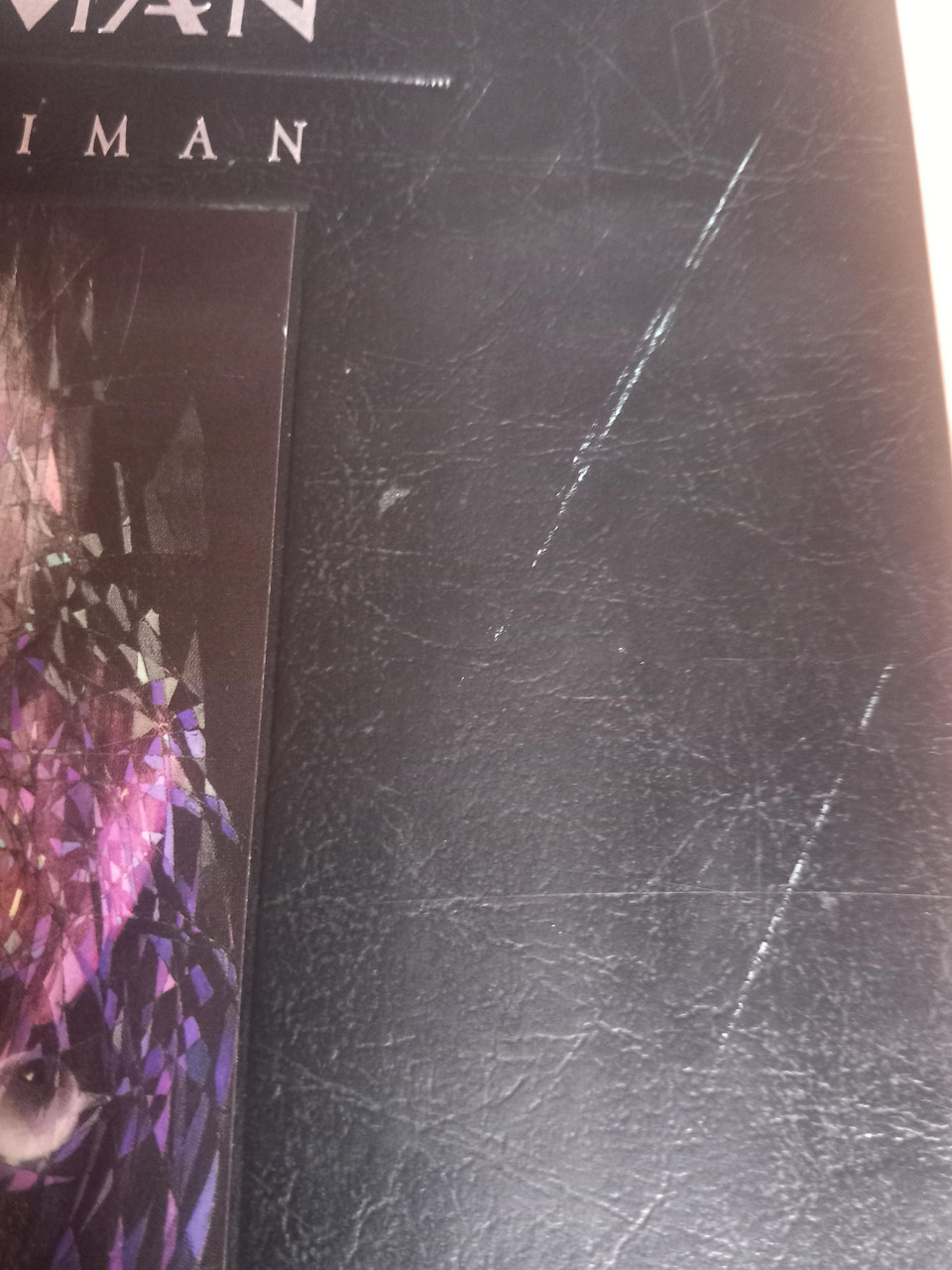 Two thin scratches to the right hand front cover of Volume 1.