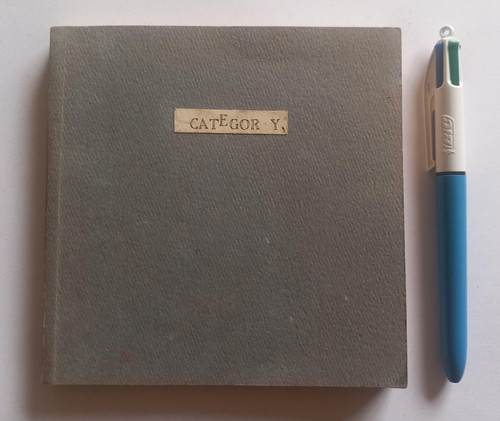 Front cover, standard pen for scale.