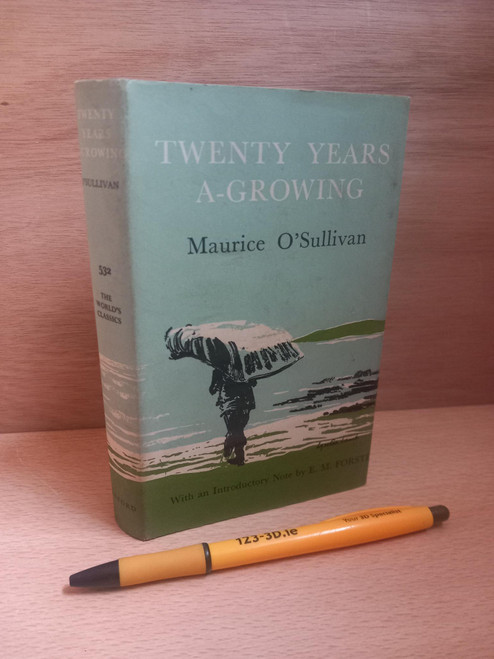 Small format hardcover, pen for scale.