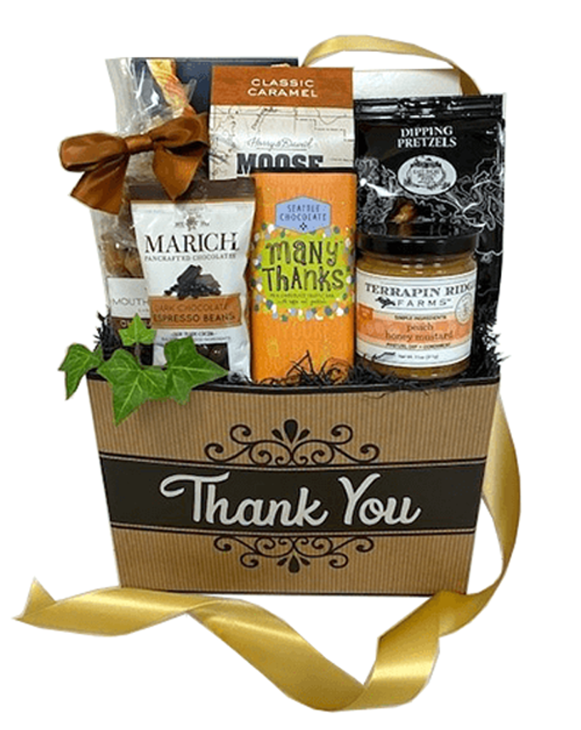 2 little words can mean so much, ‘Thank You’.  Let us help you say it with this sweet and savory snack gift featuring cheese crisps, caramel popcorn, cookies, dipping pretzels with mustard, assorted caramels, espresso chocolates, and a Many Thanks Chocolate bar.  Perfect as a professional or personal gift, sharable and memorable. Your gift will be wrapped in a clear cello with a coordinating pom bow