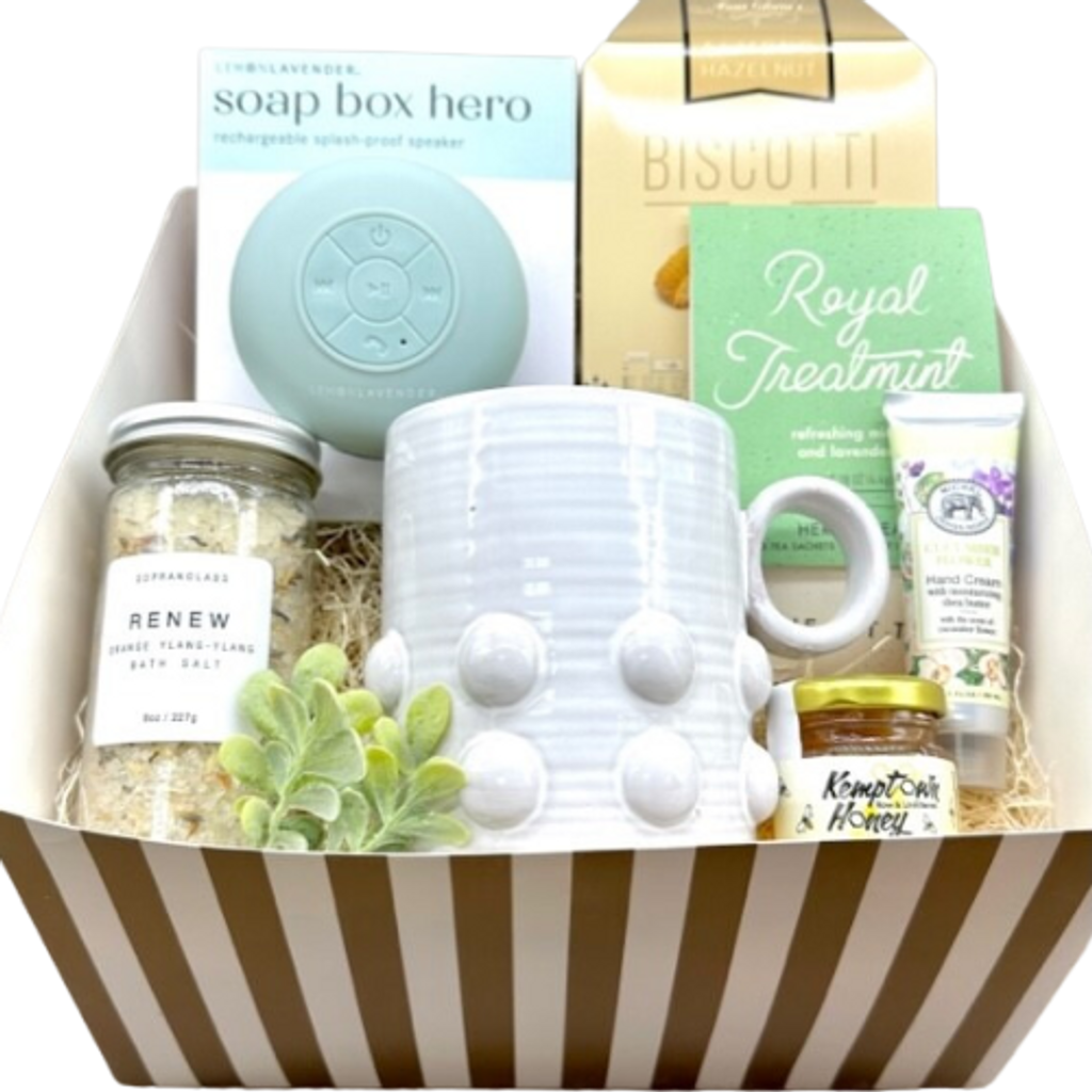 Send that someone special this gift box to help them through a hard day.  Your gift includes Royal Treatment Teas with locally sourced honey, a 16oz White Dot Mud Pie Mug, Almond Biscotti, a Soap Box Hero Splash Proof Speaker, Renew Bath Salts, Shea Butter Moistening Hand Cream, and a Ultra Soft, 100% Turkish Cotton Robe.  Your gift contents will be boxed in a gourmet gift box with the robe hand placed and bow tied on the lid.