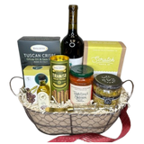 Enjoy an Italian pasta night.  This gift basket includes everything you need to enjoy a dinner in, a bottle of red wine, handcrafted pasta, olive oil & sea salt crackers, olive biscuits, Mediterranean bruschetta with spreader, Stonewall Kitchen pasta sauce, Olive Oil, and rich tiramisu wafers for dessert. Your gift will be wrapped in a clear cello with a festive tie bow.