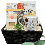 Send warm thoughts with this soup and more gift basket.  Your gift includes a mud pie ceramic soup mug features a recipe guide for a delicious soup.(mug 7"x3.5" comes with a stainless steel spoon with sentiment. Mug is dishwasher and microwave safe), Along with the mug and spoon set, a ready to make soup mix, sea salt crackers and cookies for dessert.