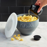 All you need for a fun night in.  Your gift created in a ready to use - silicone popper bowl, comes with a measuring kernel lid and silicone butter melter. Gift set includes 3 assorted poppin kernels, and 4 fun seasoning packets, 2 old fashioned sodas and jelly belly buttered popcorn.