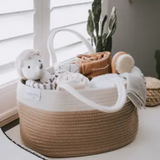 Help the new parents keep organized with this Rope Diaper Caddy Organizer. Your gift filled with hooded terry cloth towel set, organic washcloth, Organic raw shea butter baby booty cream, baby wash and sweet cheeks body powder, silicon and beech wood rattle, block set and plush teddy bear.