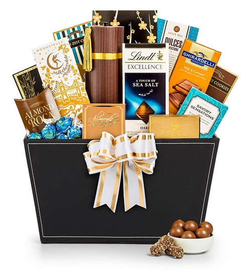 A timeless collection of classic, luxury chocolates that will be savored piece by piece, presented in a striking gift basket. A timeless collection of classic, luxury chocolates that will be savored piece by piece, presented in a striking gift basket.