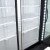 True GDM-72-HC~TSL01 78 1/8" Black Refrigerated Glass Door Merchandiser with LED Lighting, Refrigerant R290, 65.8 Cu. Ft.