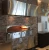 Wood Stone FA-9660-00-N-010 95"W Fire Deck Automatic Stone Hearth Oven, Natural Gas Fired, Touch Screen Control, Underfloor IR Burner, Left/Right Side Radiant Flame, 23 Sq.Ft Cooking Surface, (24) 10" Pizza Capacity, 295,000 BTUs/hr