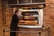 Wood Stone WS-SFR-6N-BROILER Mt. Olympus 51"W Solid Fuel Commercial Rotisserie Oven,with Charbroiler, 18–24 Chickens Capacity, Rear Load and Unload, 6-Spit, Narrow Width