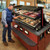 Hatco HZMS-48D 51.9"W Slant Heated Zone Merchandiser, Countertop Display, 2 Shelves, 8 Heating Zones, 12 Rods, 3000 Watts, LED Lighting, Thermostatic Control, Infrared Heat