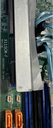 Zoomed-in photo inside the chassis showing the model of the motherboard