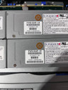 Zoomed-in photo of the dual power supply showing its part number