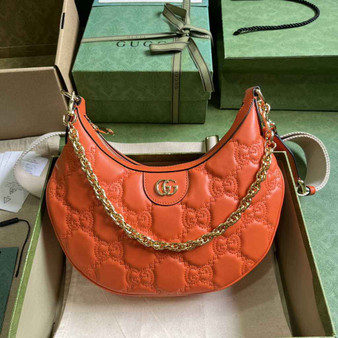 Gucci �?39709 GG Matelassé small shoulder bag in orange leather