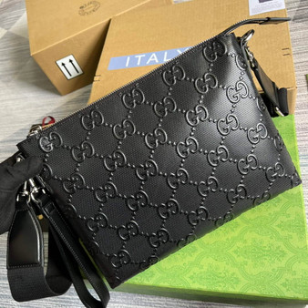 Gucci 696009 GG embossed medium messenger bag black