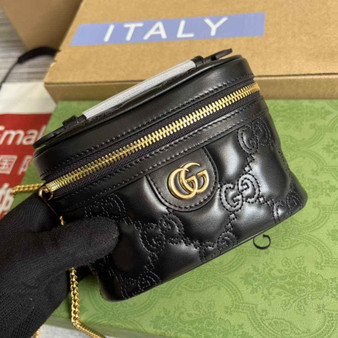 Gucci �?23770 GG Matelassé top handle mini bag Black leather