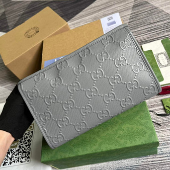 Gucci �?25568 GG embossed cosmetic case gray