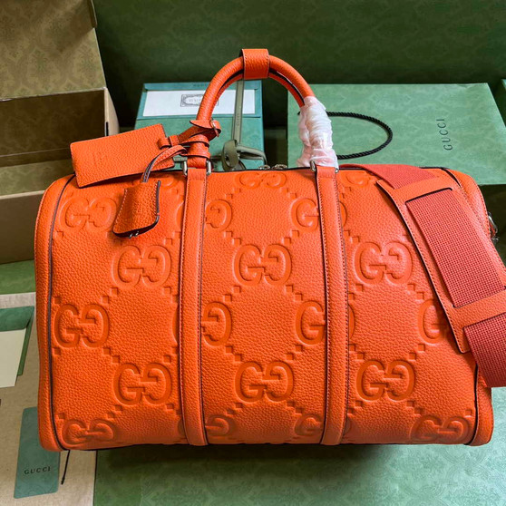 Gucci Jumbo GG small duffle bag �?25282 in Orange leather