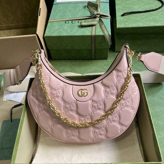 Gucci �?39709 GG Matelassé small shoulder bag in pink leather