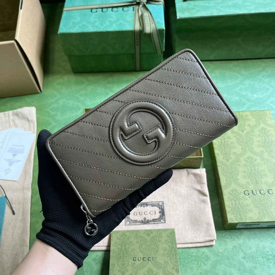 Gucci Blondie zip-around wallet 760312 in dark green leather