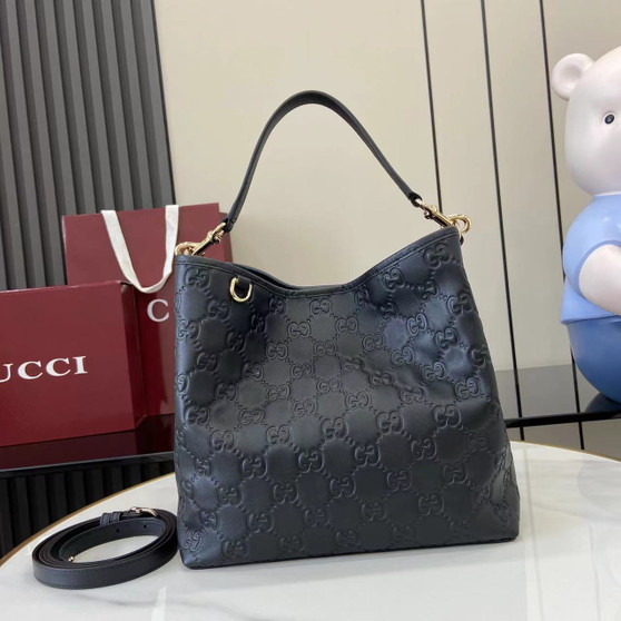 Gucci GG Emblem medium bucket bag �?15103 in black leather