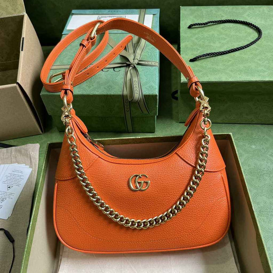 Gucci 731817 Aphrodite small shoulder bag in orange leather