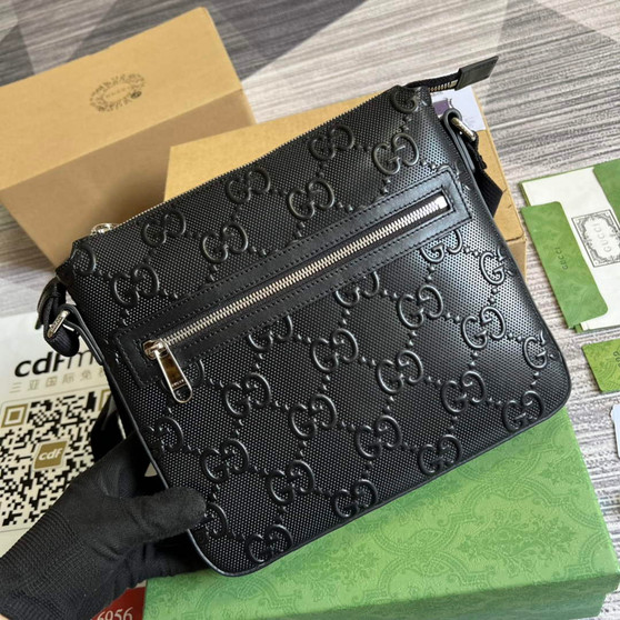 Gucci ‎406410 GG embossed messenger bag black - Default Title - View 1