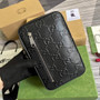 Gucci �?00431 GG embossed sling backpack black