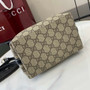 Gucci GG Emblem small bucket bag 815118 in beige and black fabric
