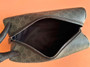 Gucci GG Emblem medium toiletry case, ‎821163 in black fabric