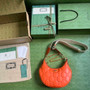 Gucci �?39709 GG Matelassé small shoulder bag in orange leather