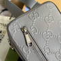 Gucci �?00431 GG embossed sling backpack Grey