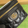 Gucci �?23770 GG Matelassé top handle mini bag Black leather