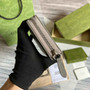Gucci ‎�?56117 GG Marmont zip around wallet Gray leather